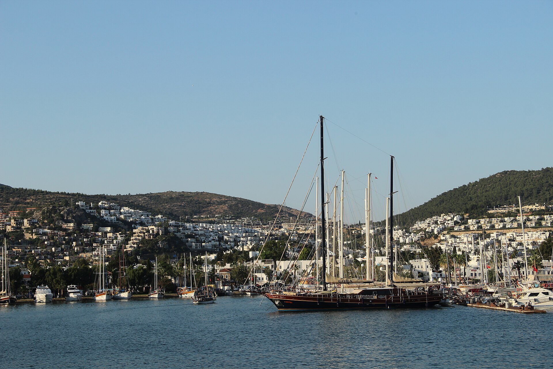 Bodrum's whitewashed waterfront and harbor viewed from the Aegean Sea near the passenger-port approach