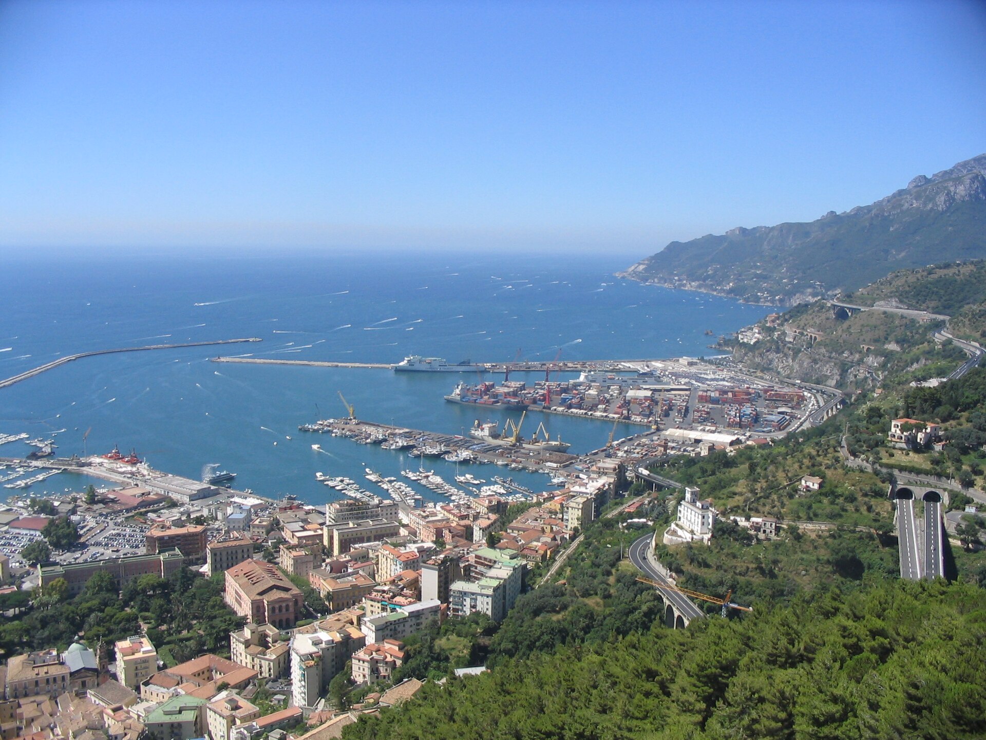 Panorama from Arechi Castle across Salerno's city waterfront, marina, commercial harbor and Gulf of Salerno