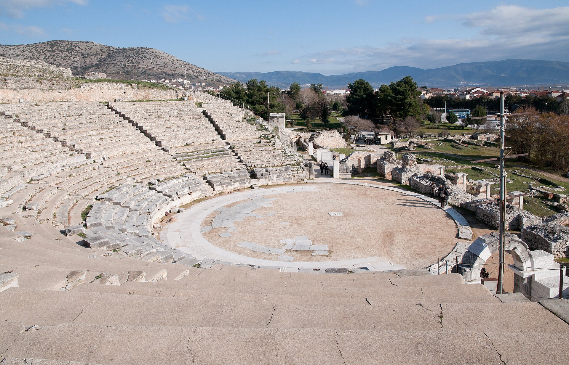 Stone seating and circular orchestra of the ancient theatre at UNESCO-listed Philippi