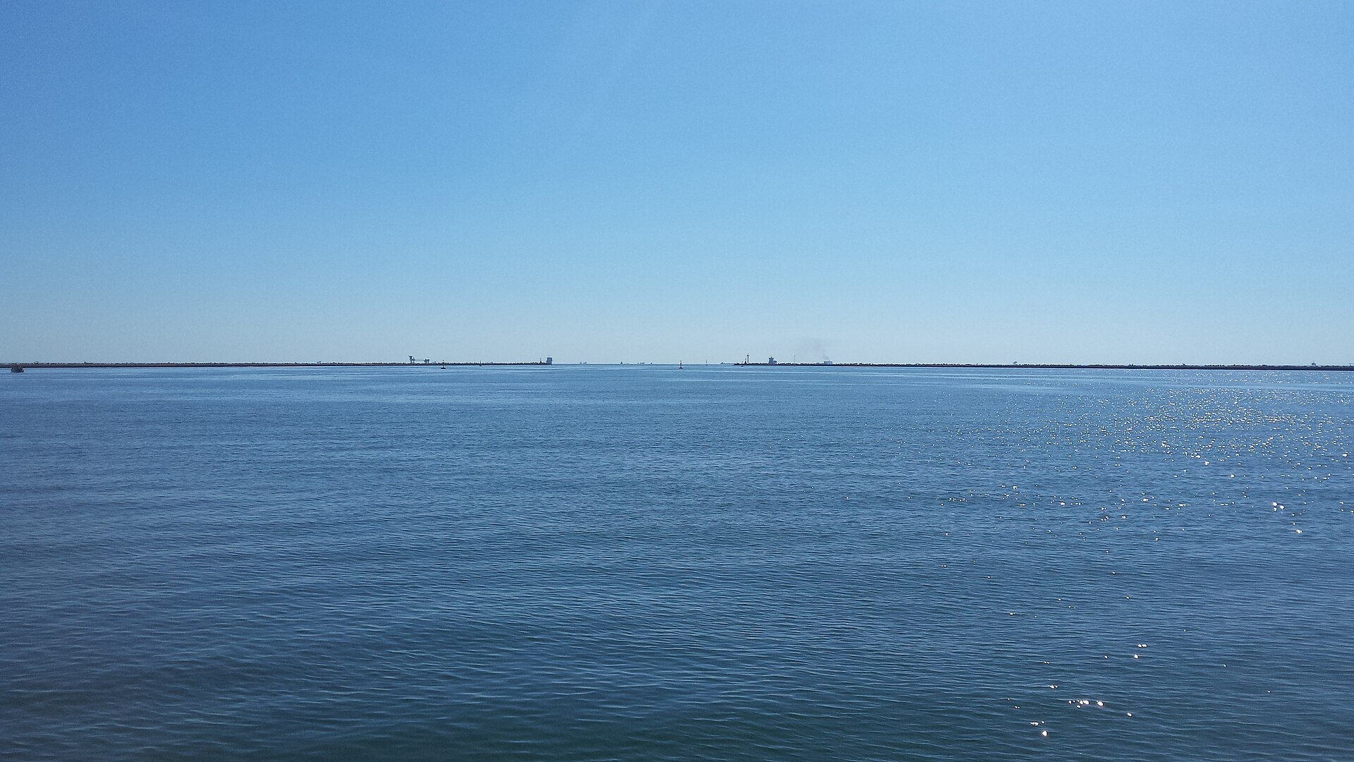 Adriatic harbor entrance and breakwaters at the Port of Ravenna