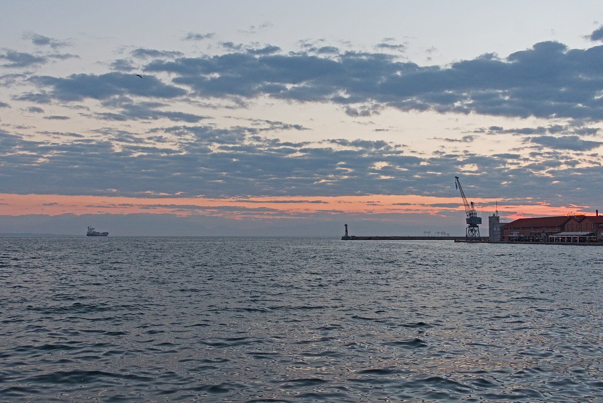 Sunset over the passenger-port waterfront and Thermaic Gulf at Thessaloniki