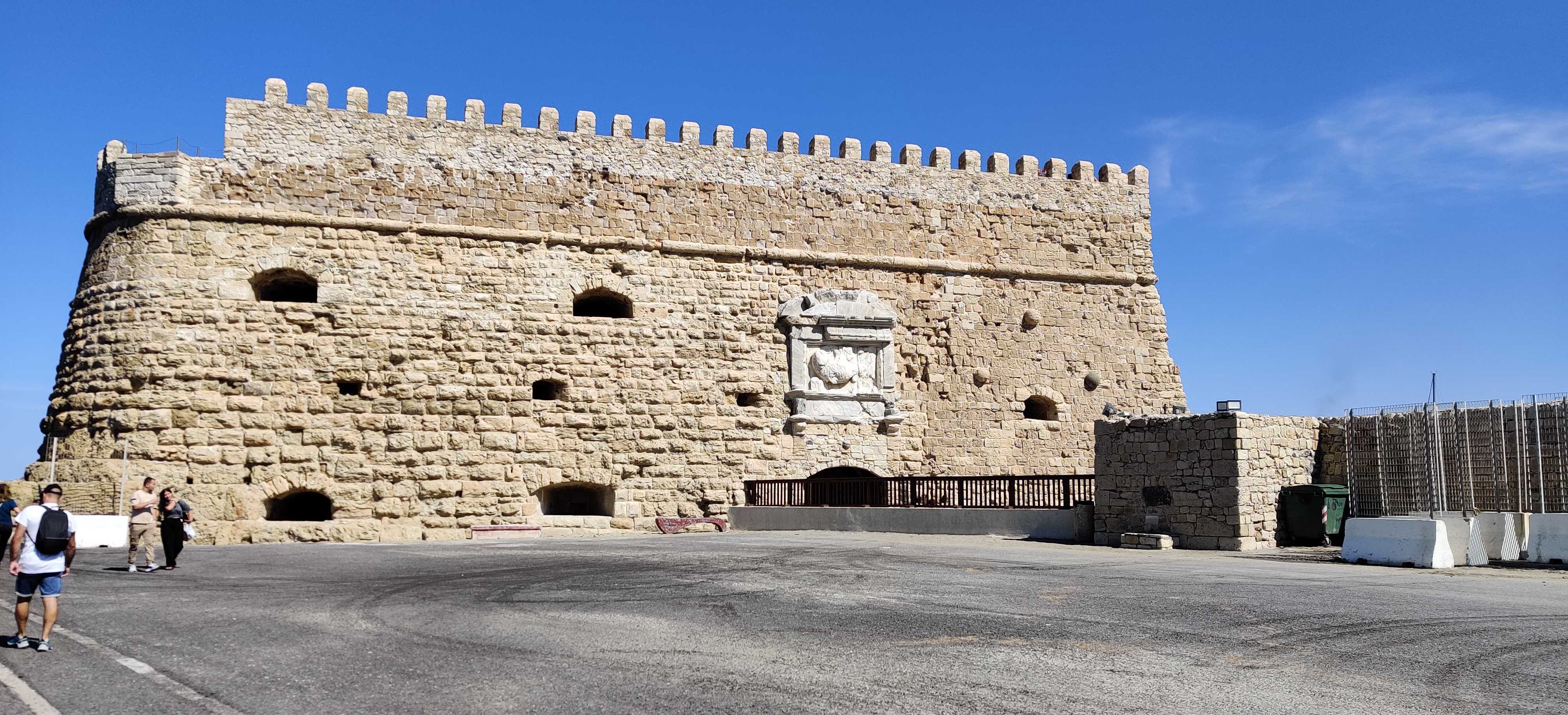 Koules fortress beside Heraklion's Venetian harbor under a bright blue sky