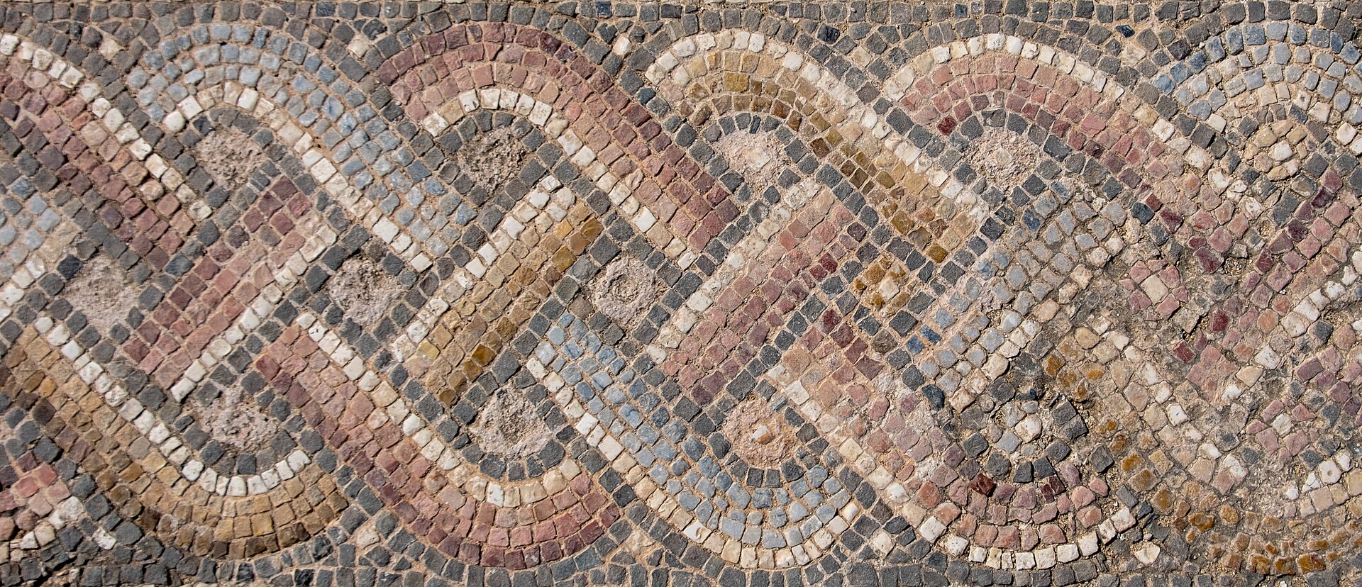 Geometric Roman floor mosaic at Kato Paphos Archaeological Park in Cyprus