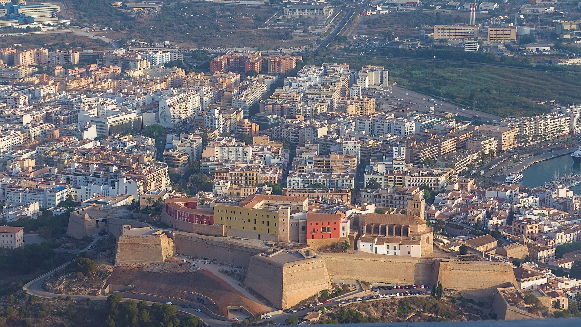 Aerial view of Ibiza's fortified Dalt Vila, cathedral, lower city and harbor
