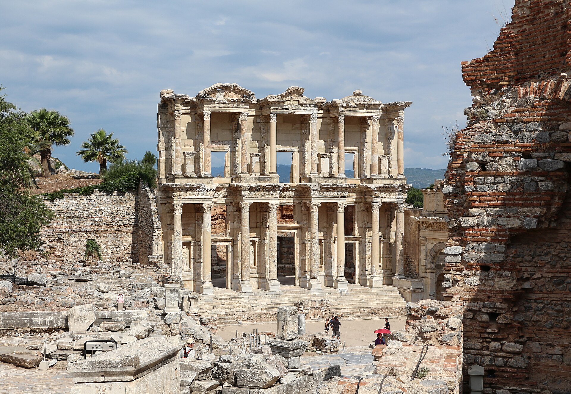 Library of Celsus façade rising above the stone-paved ruins of ancient Ephesus